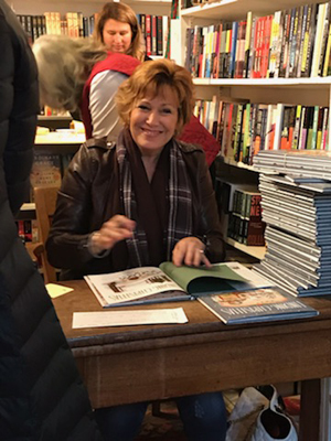Signing books at the King's English Book Shop